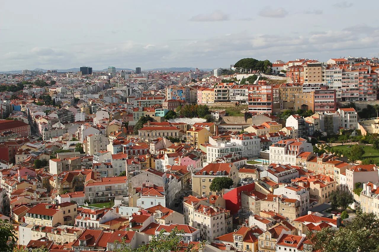 View over Lisbon rooftops and the Tagus from the Graça viewpoint